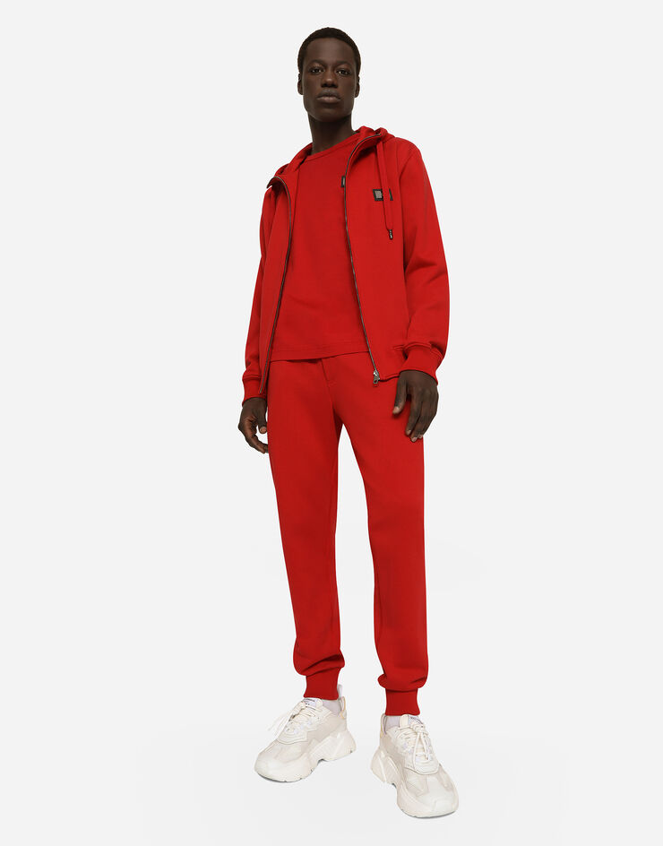 Dolce&Gabbana Pantalon de jogging en jersey avec plaquette à logo Rouge GVXQHTG7F2G