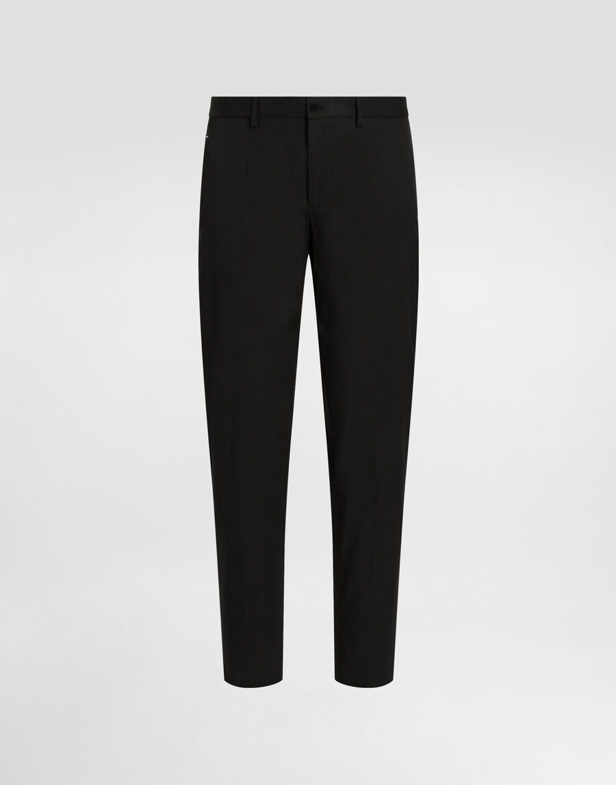 Stretch cotton pants with branded tag