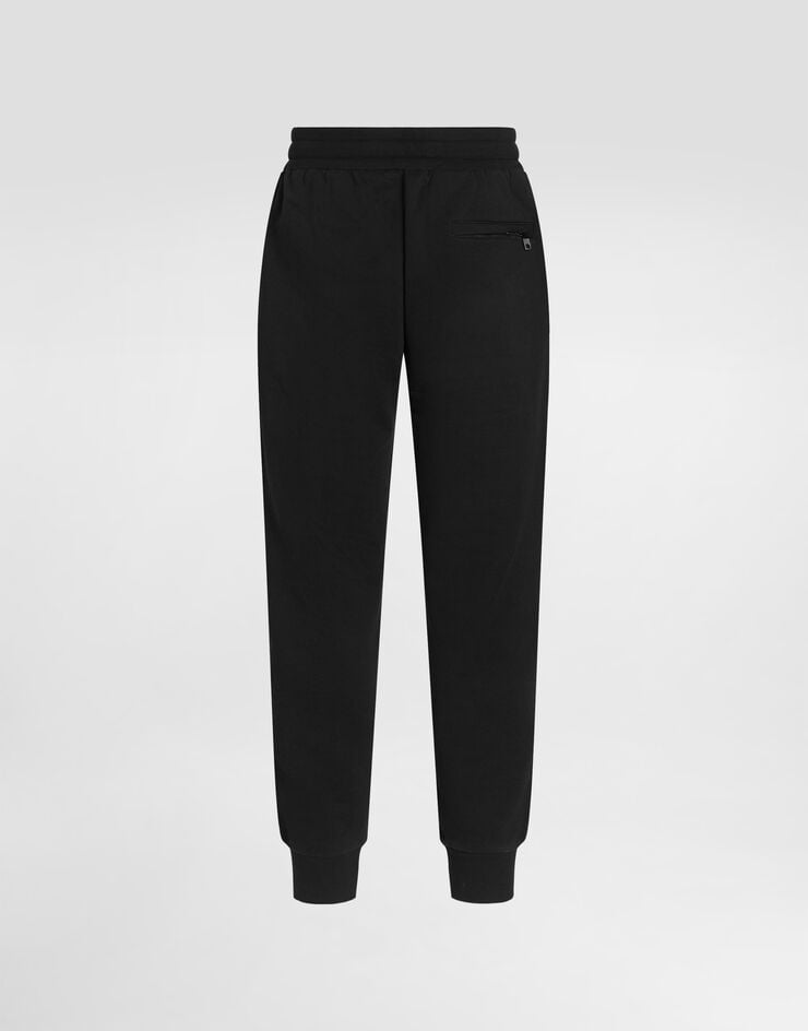 Dolce & Gabbana Jersey trousers with heraldic patch Black GP07TZG7PZT