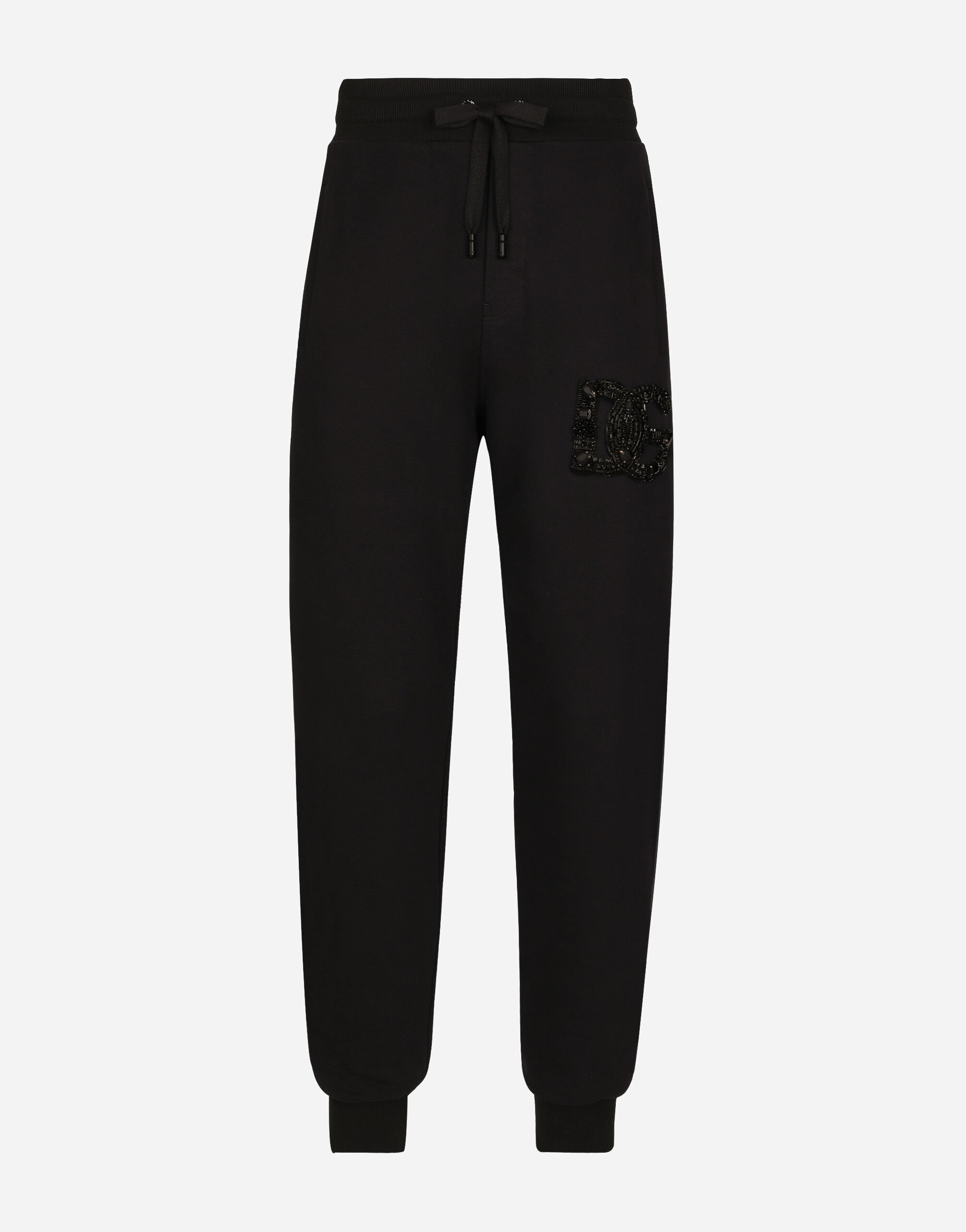 Dolce & Gabbana Jogging pants with rhinestone-detailed DG patch Black G9ZU0ZG7K4P