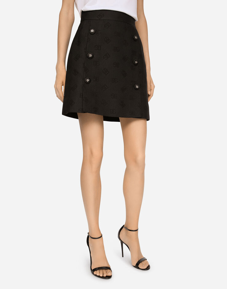 Dolce & Gabbana Mini-jupe en jacquard à logo DG all-over Noir F4B7RTFJTBP