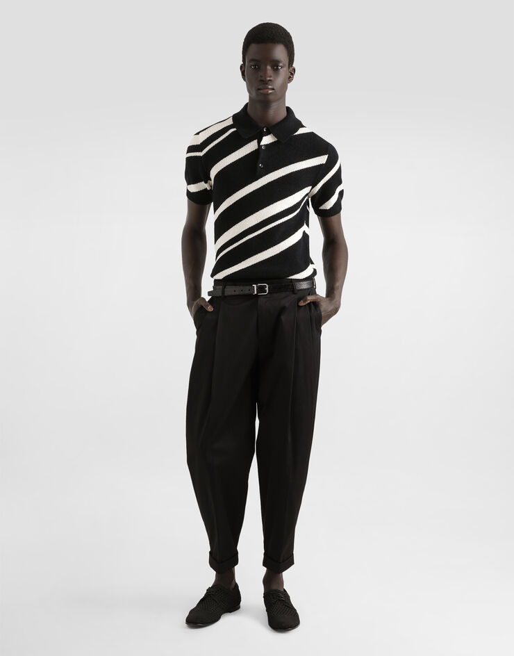 Dolce & Gabbana Jersey polo de algodón de manga corta con intarsia a rayas Multicolor GXZ64TJFMMS