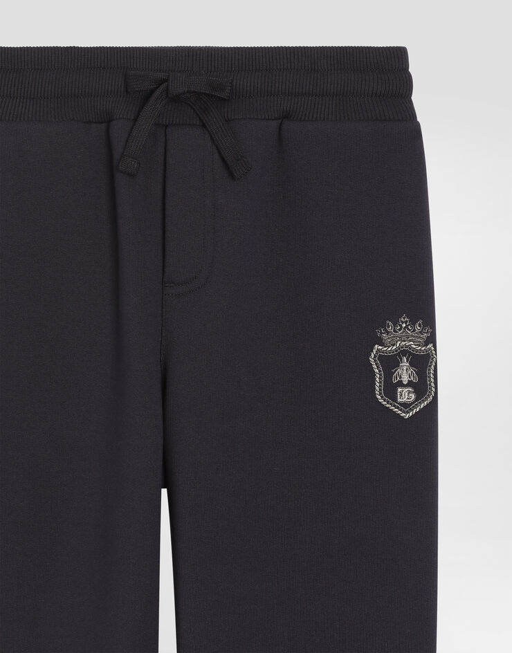 Dolce & Gabbana Fleece trousers with patch Blue L4JPIGG7PMH