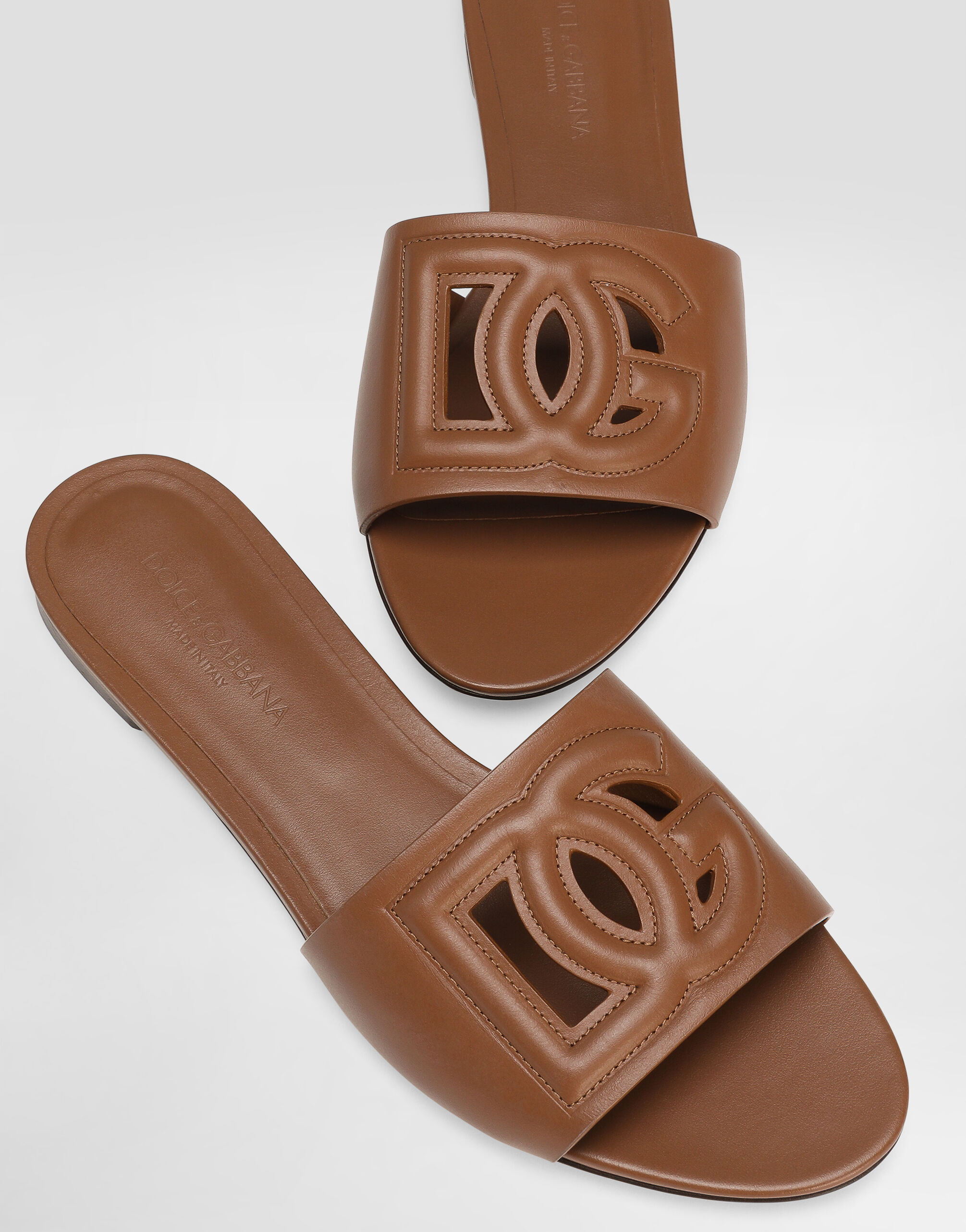 Calfskin sliders with DG logo in Brown for Women
