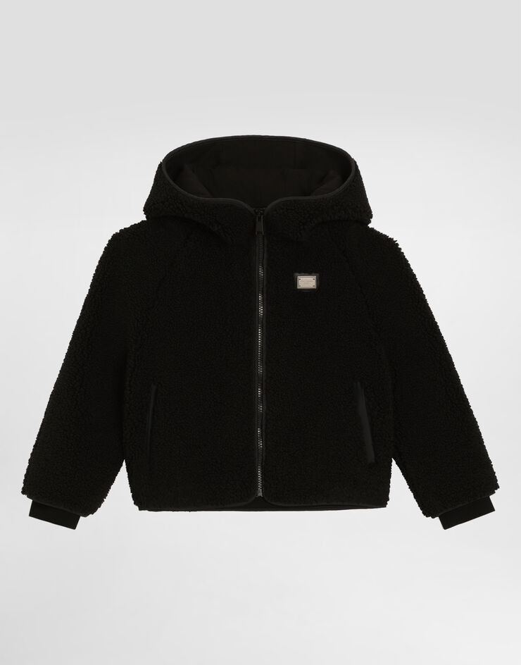 Dolce & Gabbana Jacke aus Kunstfell mit Logoplakette Schwarz L4JB7LFUP7K
