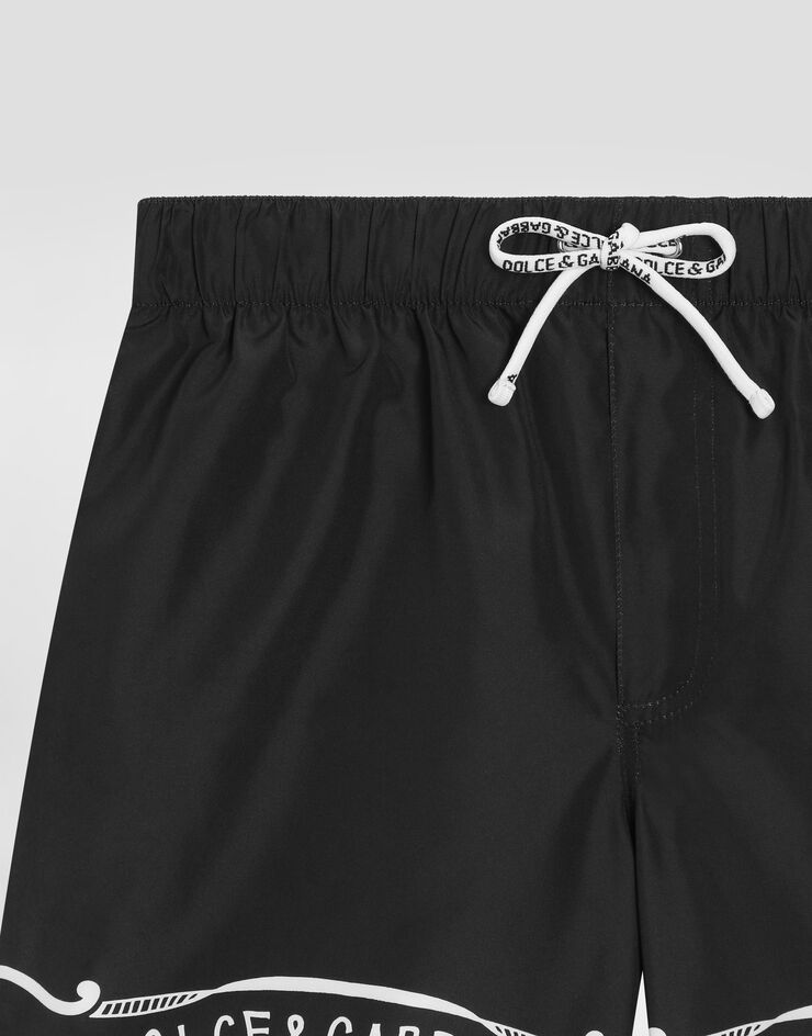 Dolce & Gabbana Fabric swim trunks with bandanna print Print L4J818ON04M