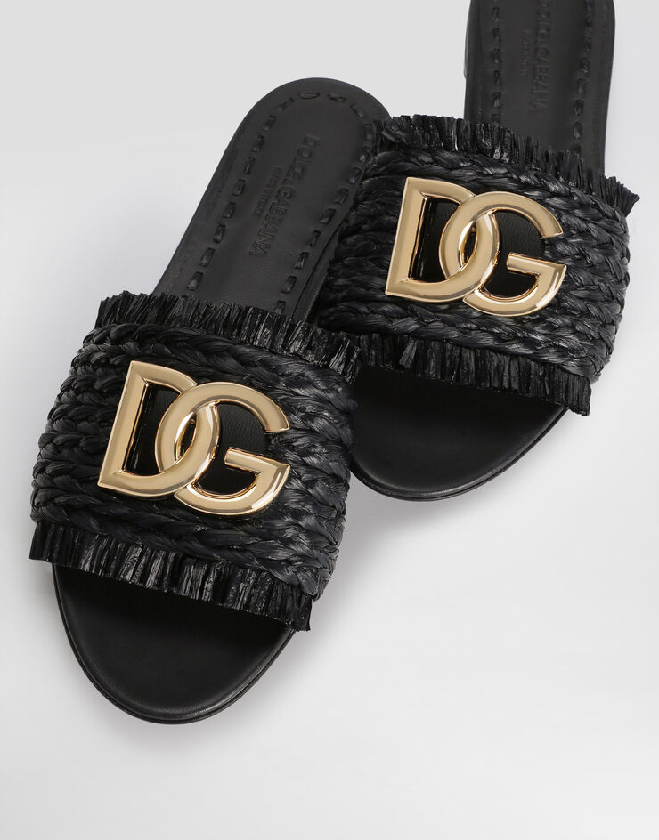Dolce & Gabbana Woven raffia slippers with fringe Dolce & Gabbana Woven raffia slippers with fringe Black CQ0646AN217