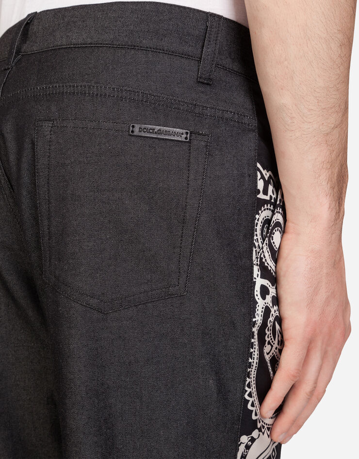 Dolce & Gabbana DENIM PANTS WITH INSERTS IN BANDANA PRINT MULTICOLORED GYK0ADG8BX2