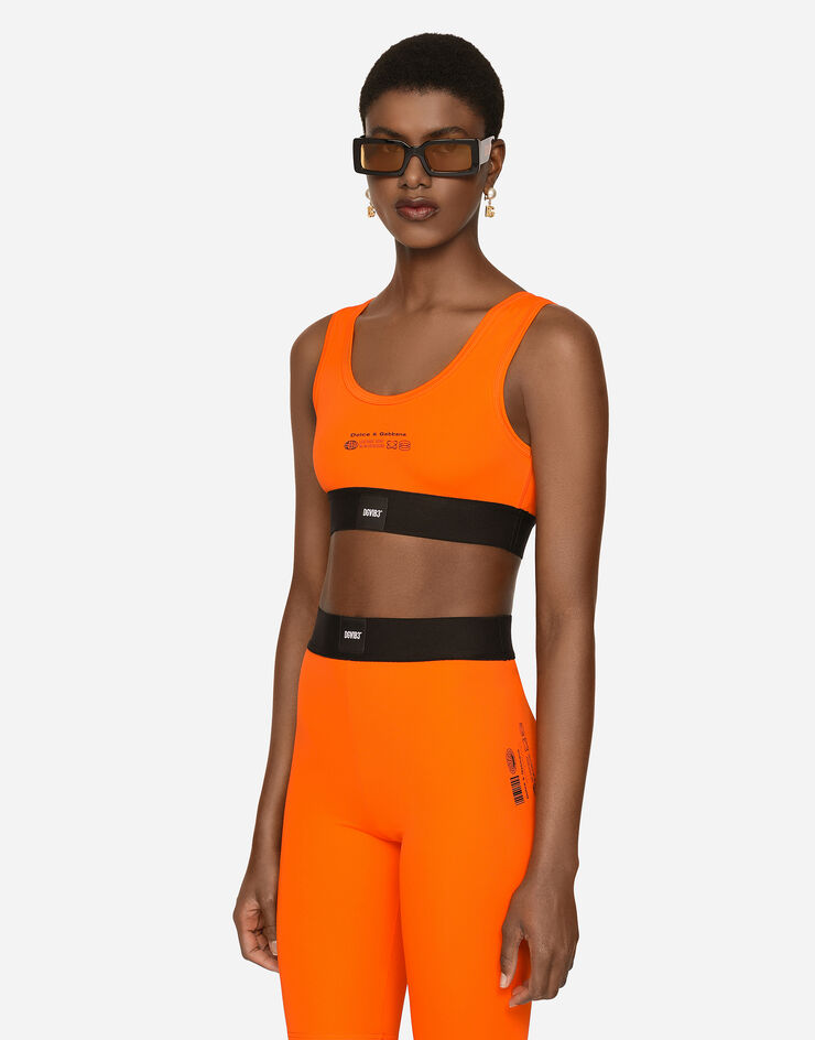 Dolce & Gabbana Bralette-Top aus maschenfestem Jersey mit Print DGVIB3:<br>• Orange<br>• Gerader Ausschnitt<br>• Enge Passform<br>• Ungefüttert<br>• Der Artikel hat bei Größe 40 IT eine Länge von 9 cm ab der hinteren Mitte<br>• Das Model ist 175 cm groß und trägt Größe 40 IT<br>• Made in Italy DGVIB3 Orange F79BWTG7K6V