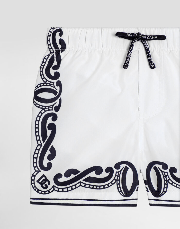 Dolce & Gabbana Fabric swim trunks with bandanna print Print L1J818ON04N