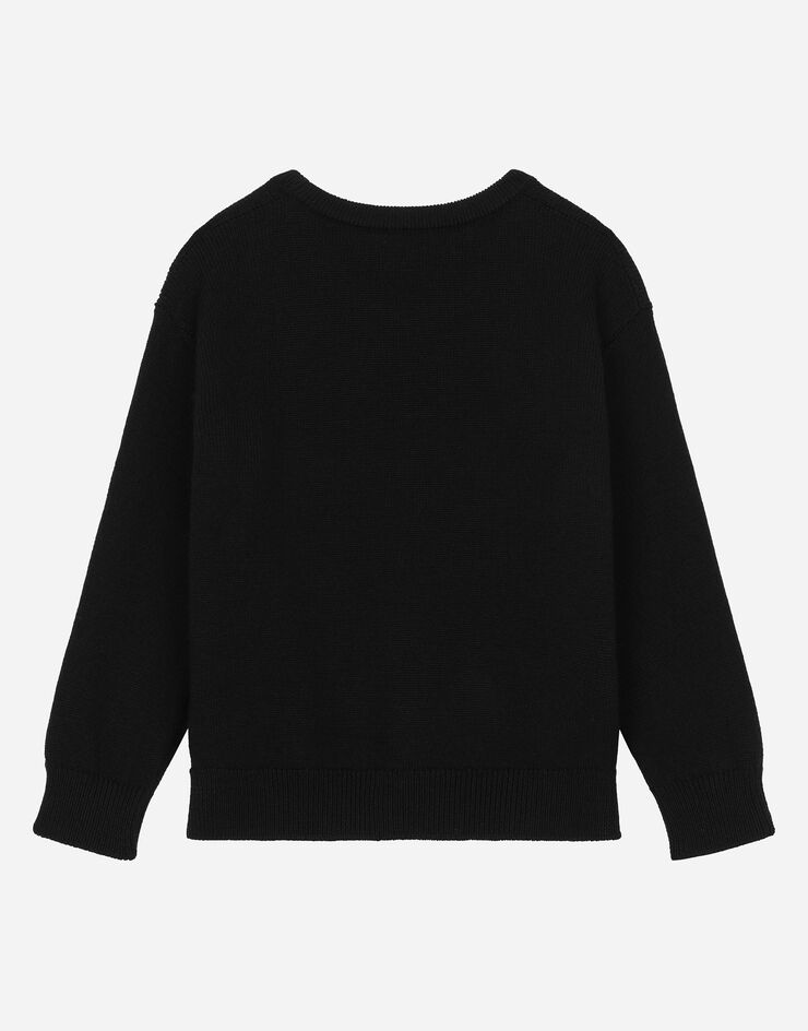 Dolce & Gabbana Pullover in lana con placca logata Nero L4KWE2JCVU9