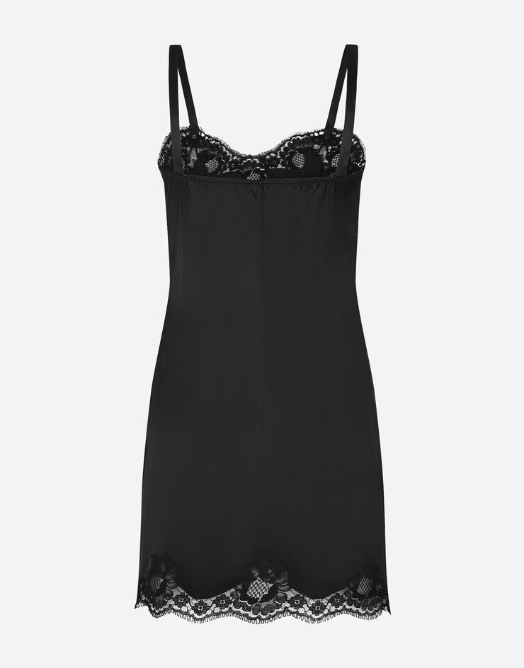 Dolce & Gabbana Das edle Dessous-Unterkleid aus Seidensatin mit Spitzenkanten ist das perfekte Kleidungsstück für einen sinnlichen und edlen Look. SCHWARZ O6A00TONO13