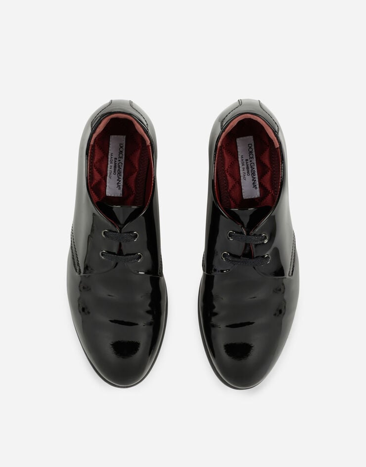 Dolce & Gabbana حذاء ديربي من جلد لامع أسود DA0250A1328
