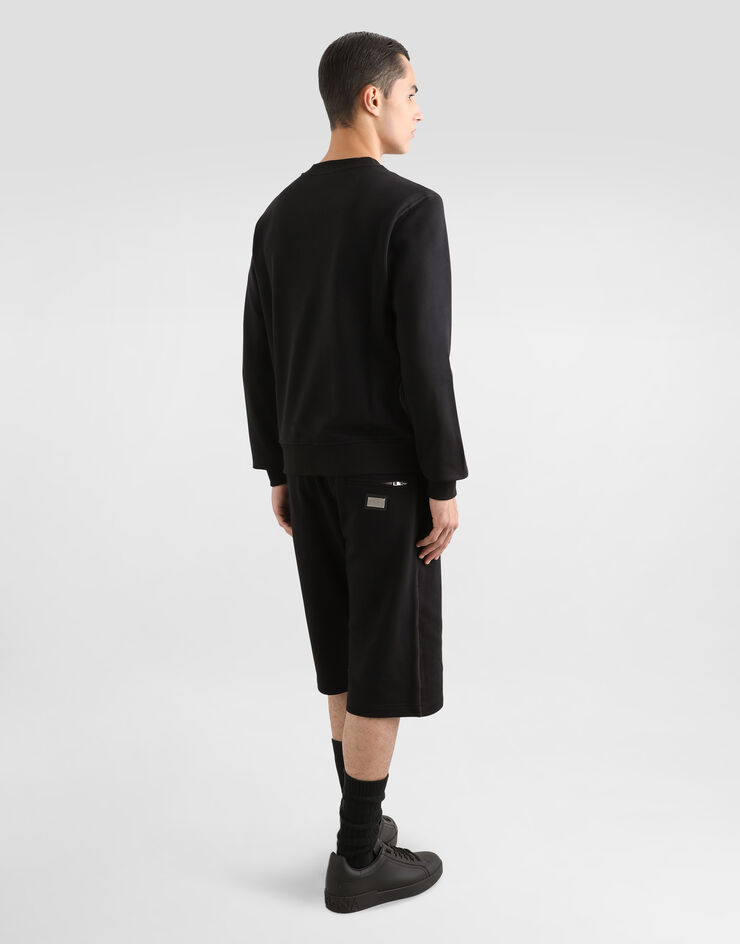 Dolce & Gabbana Bermudas de chándal en punto con placa con logotipo Negro GVB7HTG7F2G