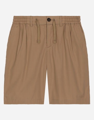 DolceGabbanaSpa Bermudas de popelina elástica con placa con logotipo Beige L42Q95FUFIP
