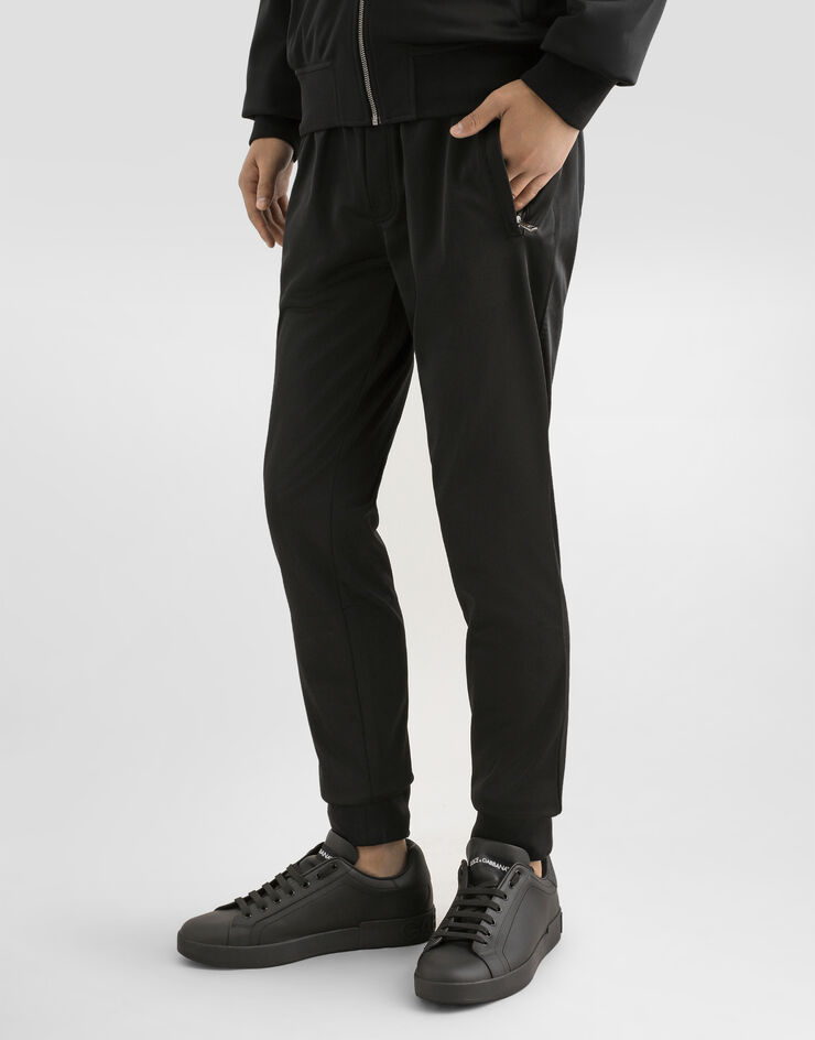 Dolce&Gabbana Pantalón de chándal en punto con placa con logotipo Negro GVXQHTG7F2G