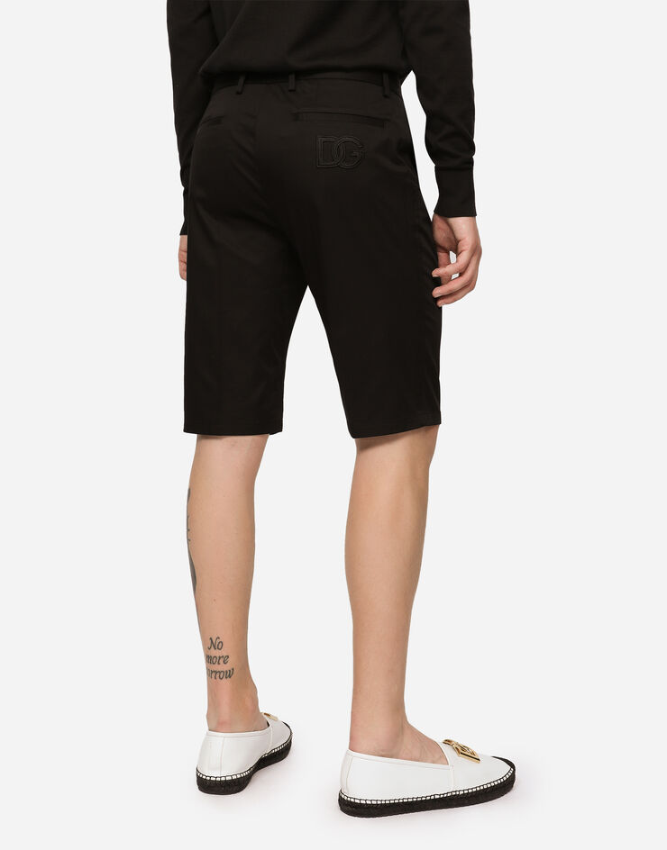 Dolce & Gabbana Bermudas Baumwollstretch mit DG-Stickerei Schwarz GWRREZFUFJR