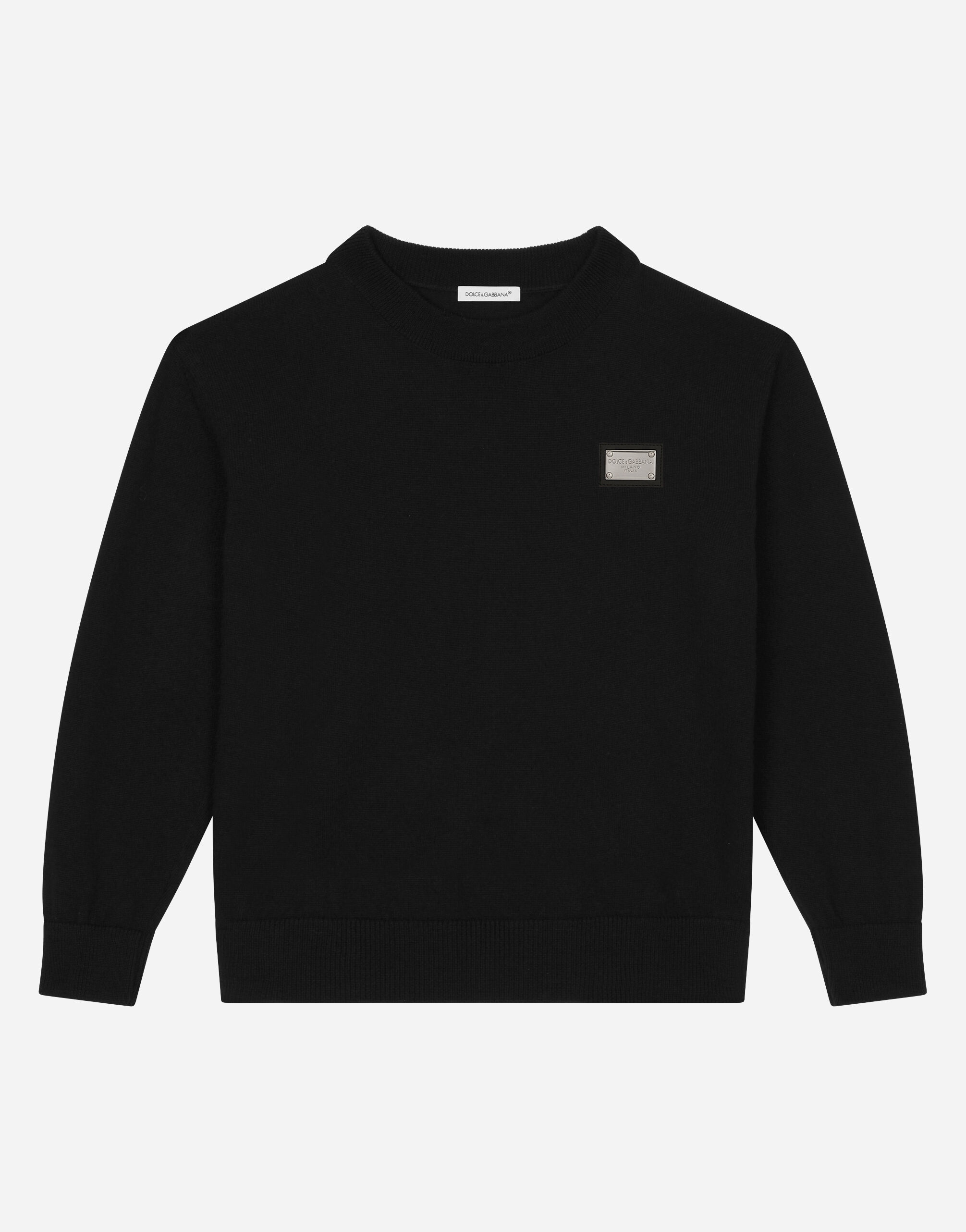Dolce & Gabbana Round-neck plain knit sweater with logo tag Negro L4KWE1JCVR9