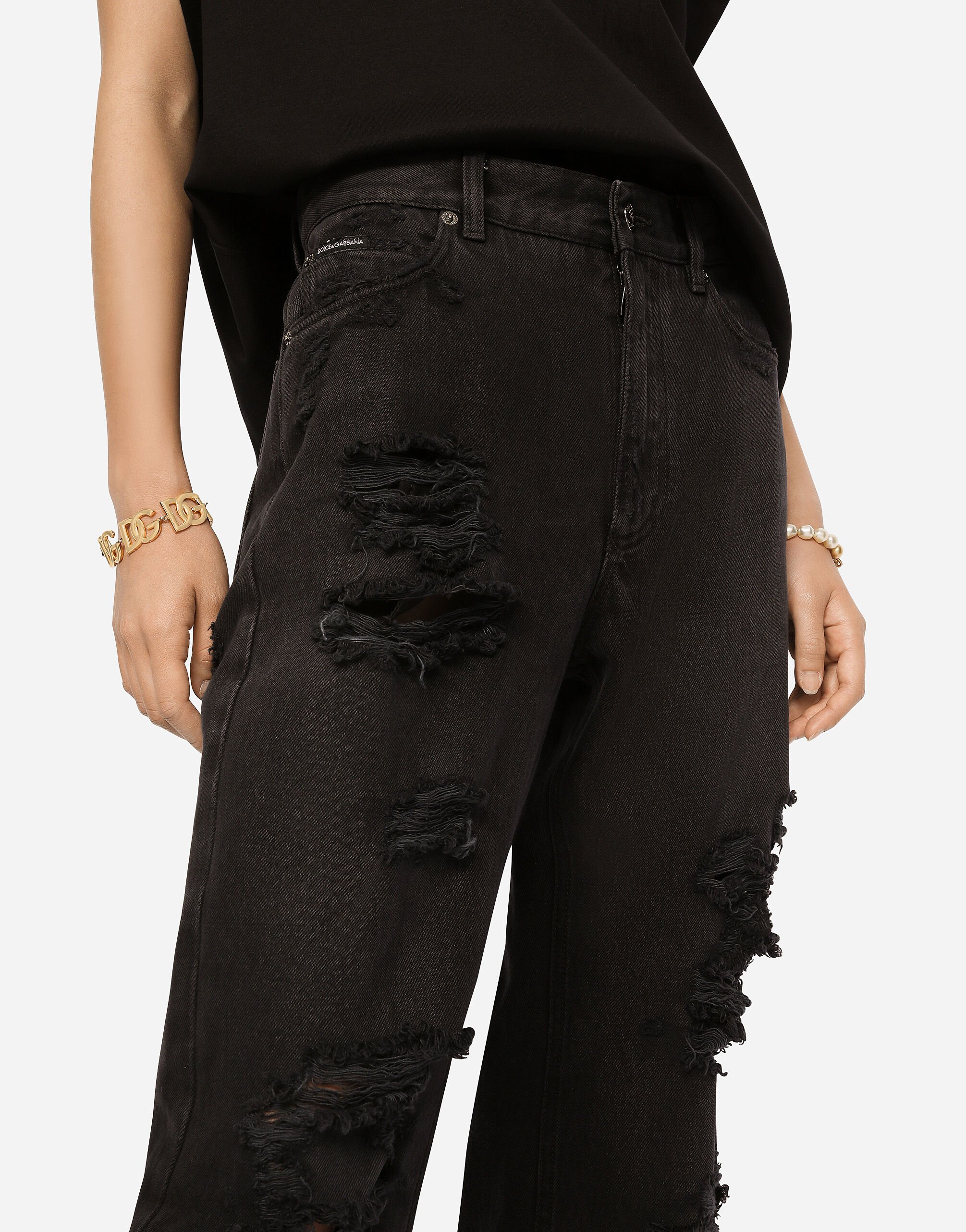 Flared jeans with ripped details in Multicolor for Women