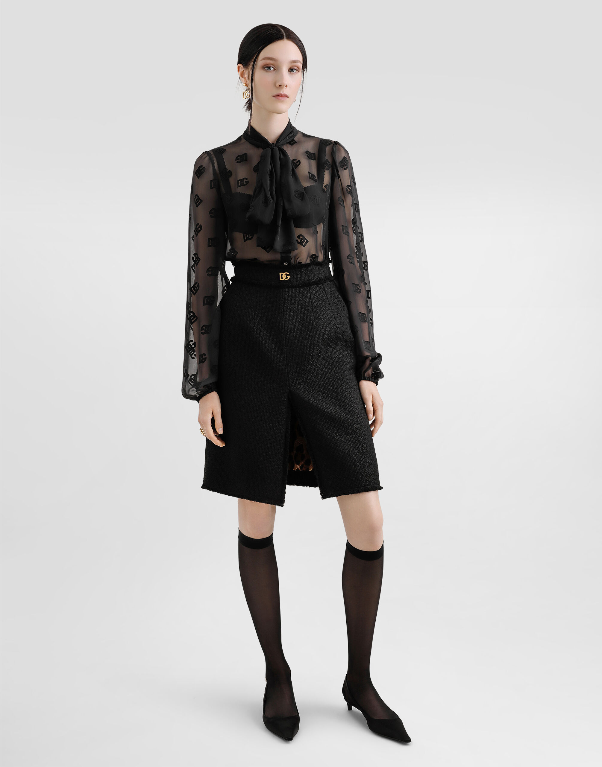 Raschel tweed midi skirt with central slit and DG logo in