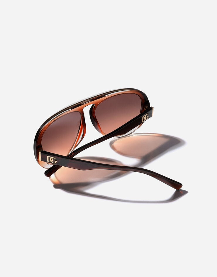 Dolce & Gabbana Lunettes de soleil à imprimé Maiolica Arancione Dolce & Gabbana Lunettes de soleil à imprimé Maiolica Arancione Transparent gradient orange VG4555VP078