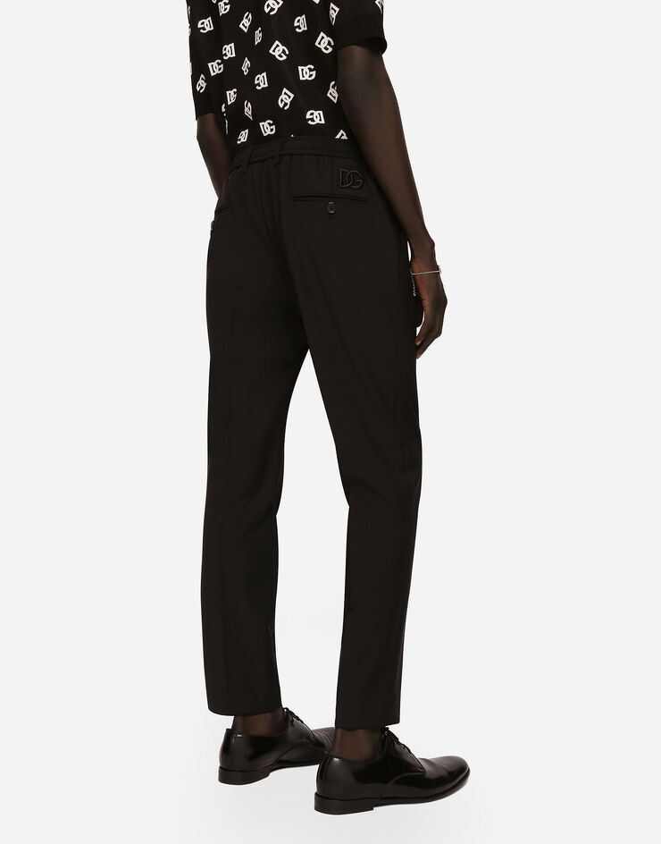 Dolce&Gabbana Pantalón de algodón elástico con bordado DG Negro GW13EZFURIR