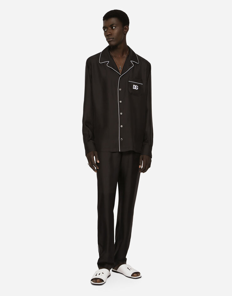 Dolce & Gabbana سروال للركض حرير برقعة DG مطرزة أسود GVCRAZGF856
