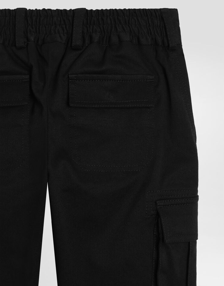 Dolce & Gabbana Cargohose aus Gabardine mit Logoplakette aus Metall Schwarz L44P81FUFL3