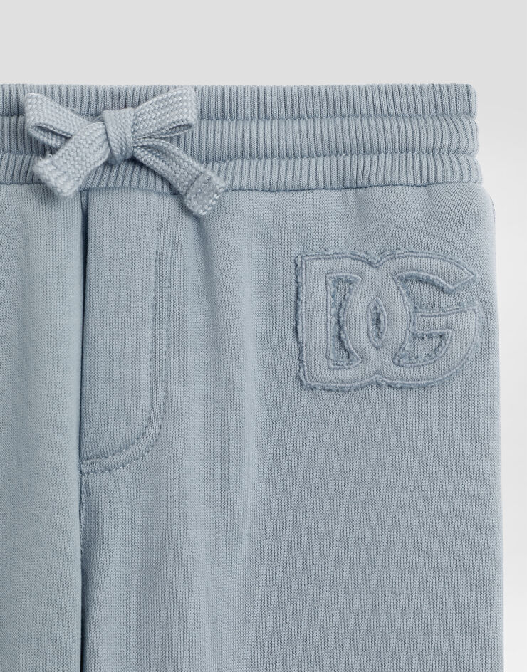 Dolce & Gabbana Oversized fleece trousers with leopard print and DG patch Blue L1JPIGG7PJD