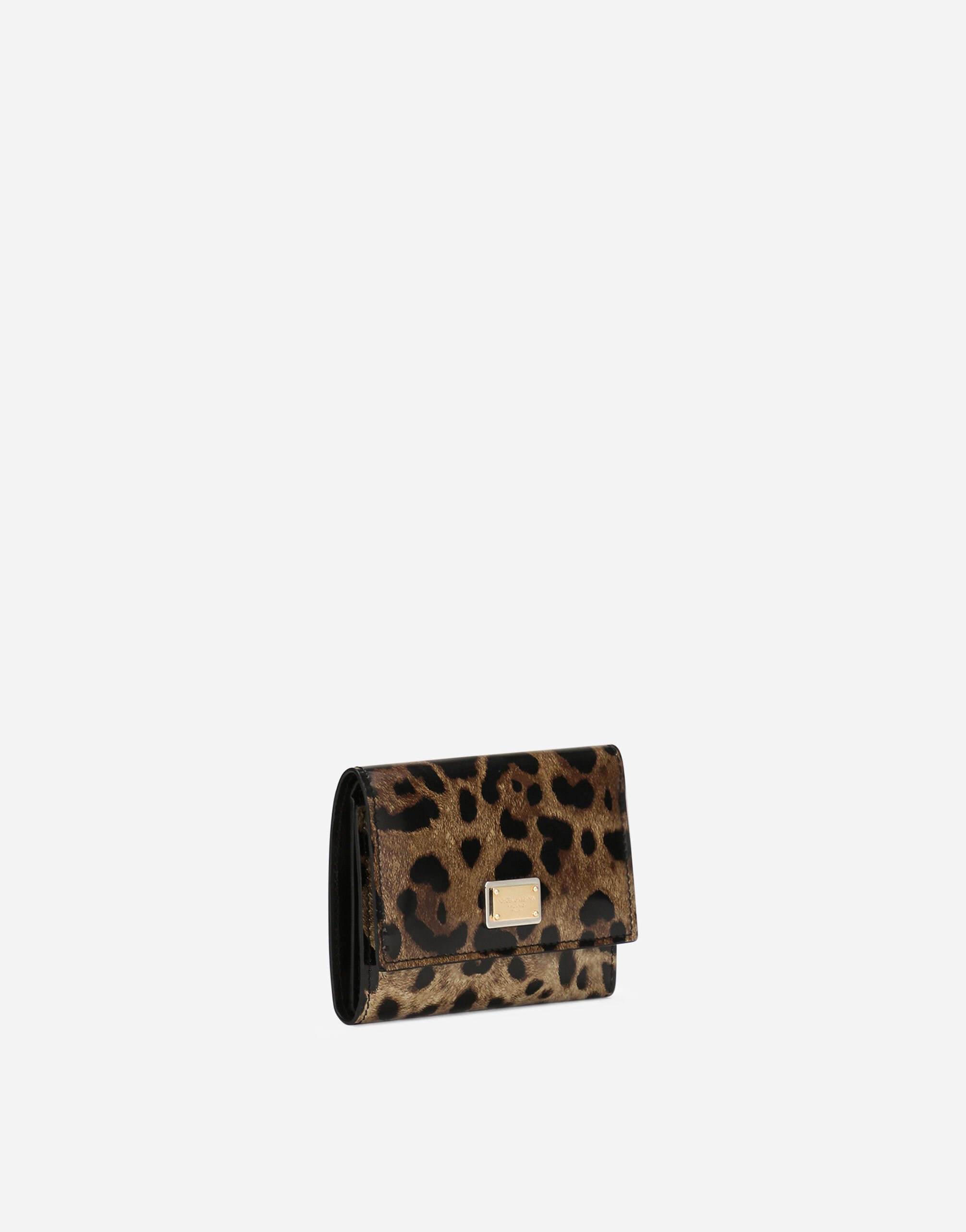 Polished calfskin wallet with leopard print in Animal Print for
