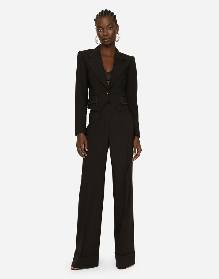 Dolce & Gabbana Pantalones palazzo en tela de lana con dobladillo Negro FTBM0TFUBAJ
