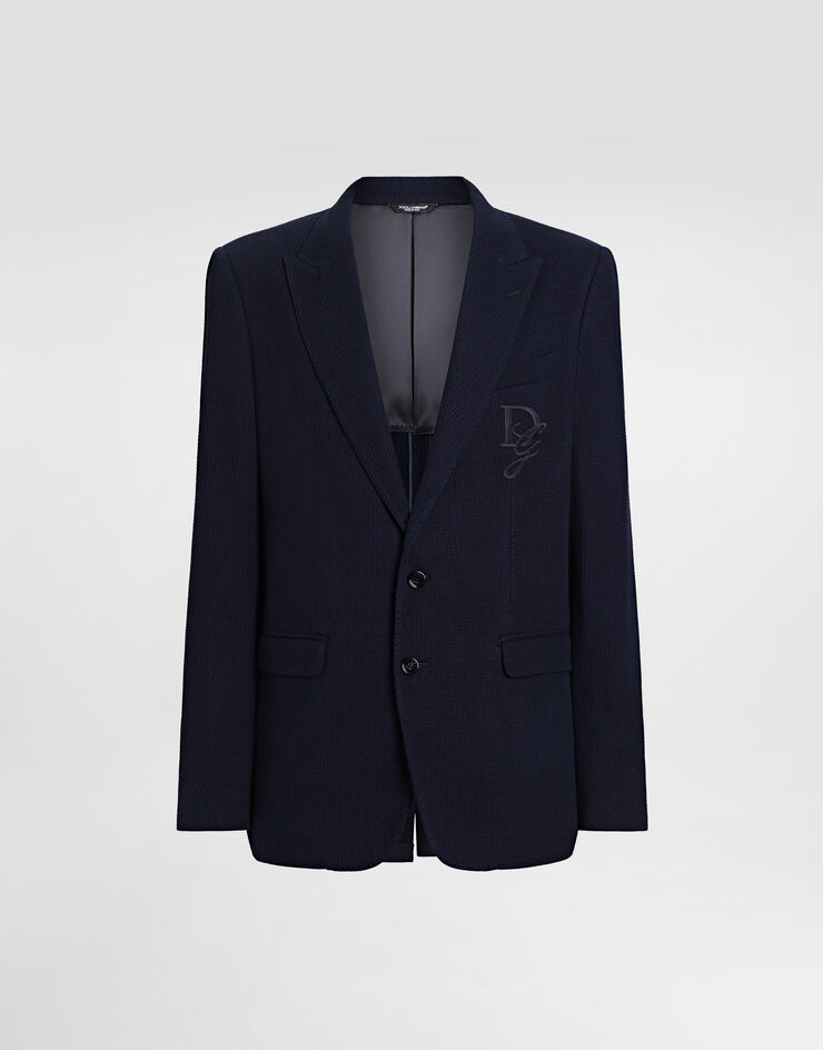 Dolce & Gabbana جاكيت من جيرسي قطن بصف أزرار واحد وتطريز شعار أزرق G2TJ5ZGJ078