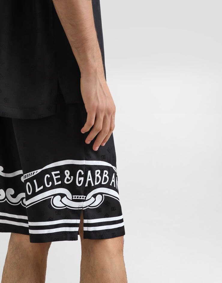 Dolce & Gabbana شورت حرير بتفاصيل طبعة ربطة رأس أسود GV37ATGI979