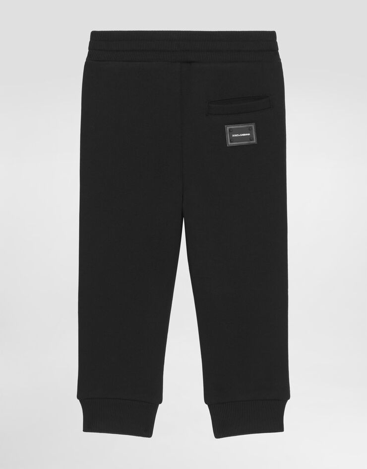 Dolce & Gabbana Jersey jogging pants with logo plate Black L4JPT0G7OLJ