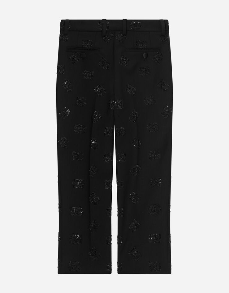 DolceGabbanaSpa Pantalón clásico de lana con motivo integral del logotipo de strass termoadhesivos Noir L44P27G7J8K