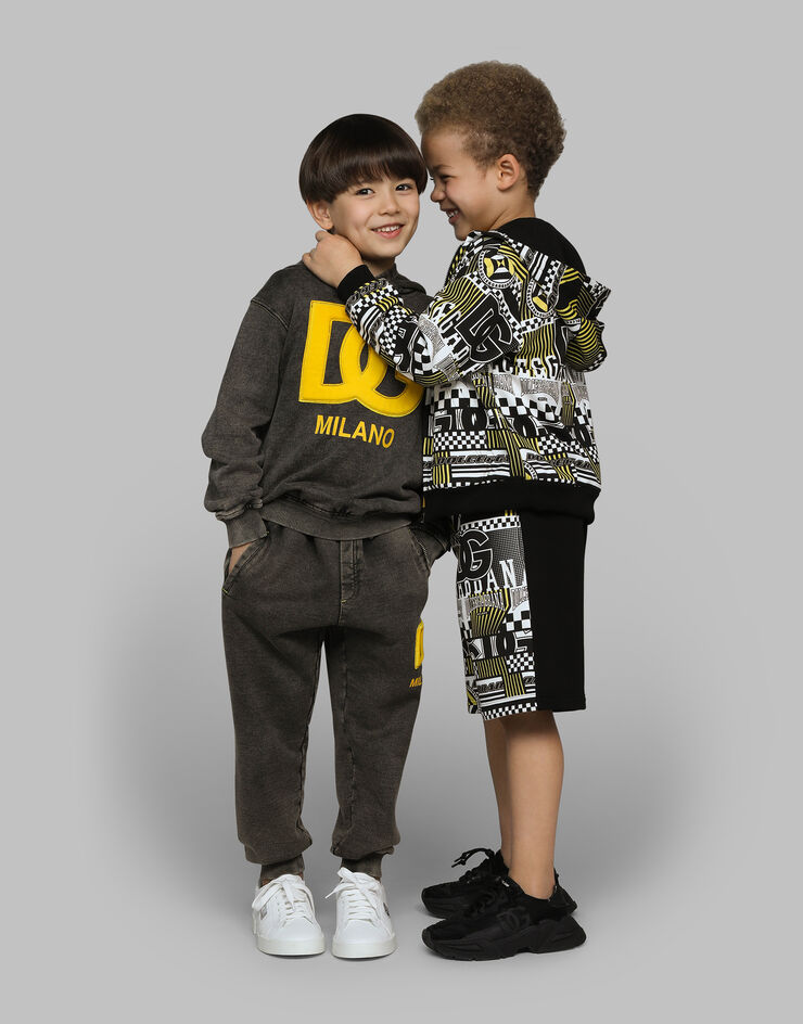 Dolce & Gabbana Sudadera con capucha de punto efecto lavado con logotipo DG Negro L4JWFJG7N3Z