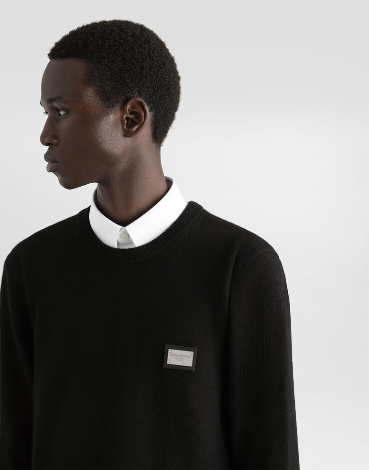 Dolce & Gabbana Wool round-neck sweater with branded tag Black GXO39TJGMG9