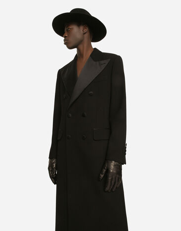Dolce & Gabbana Zweireihiger Mantel aus Wollkrepp mit Stretchanteil Schwarz G040LTFUBCI