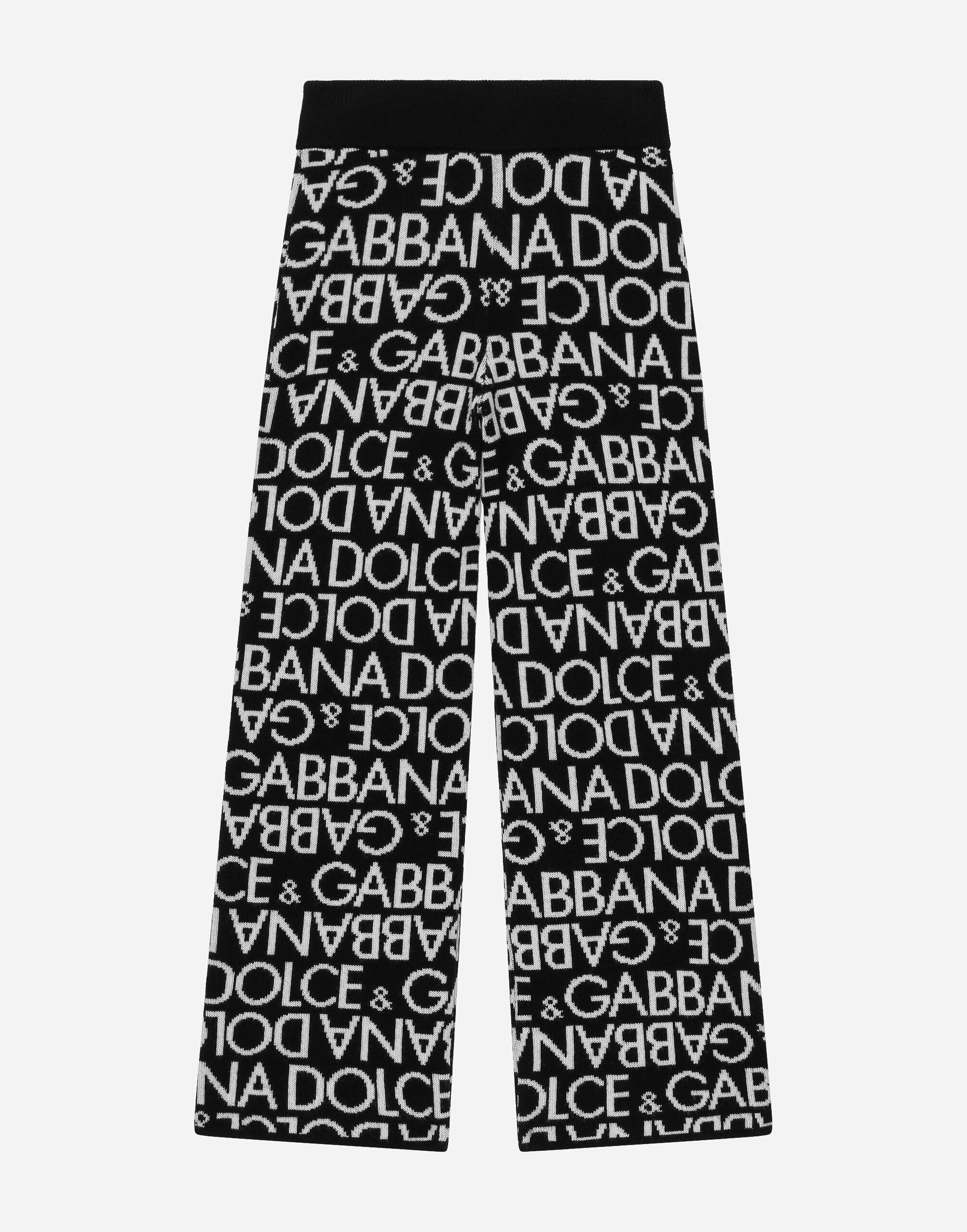 Dolce&Gabbana Pantalón de punto con motivo integral del logotipo en jacquard Blanco L5JTKTG7J7W