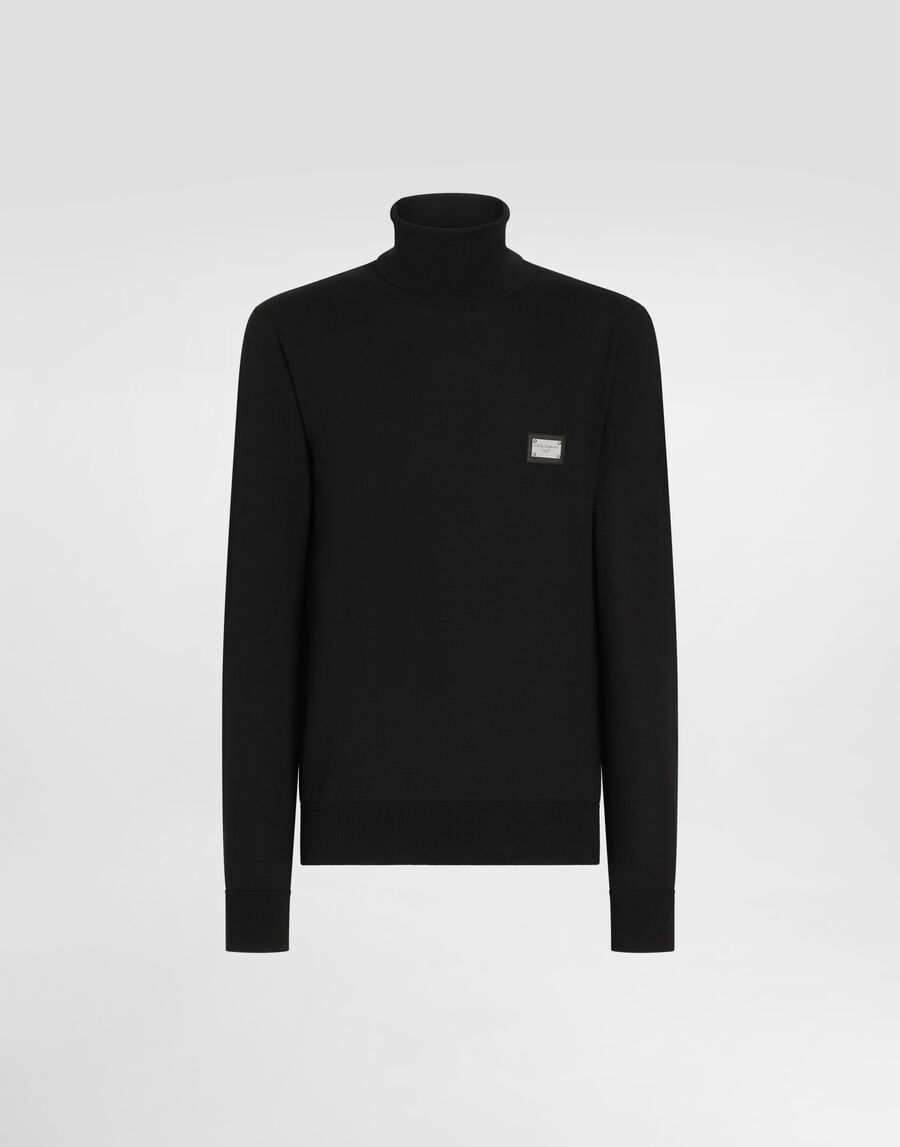 Wool turtle-neck sweater with branded tag