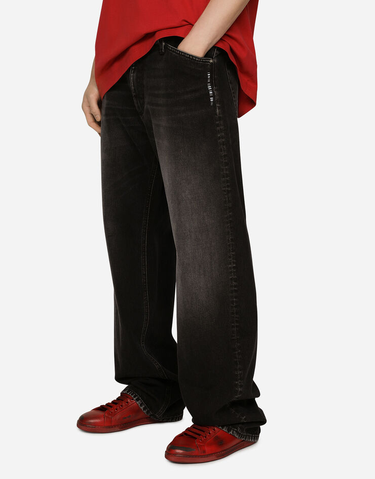 Dolce & Gabbana جينز فضفض مغسول بساق عريضة وطبعة DGVIB3 متعدد الألوان GZ29ADG8JW5