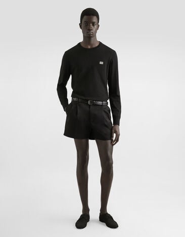 Dolce & Gabbana Jersey de cuello redondo de algodón con placa Negro GXX02TJBCE9