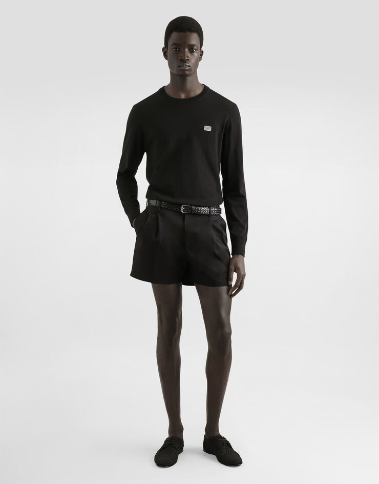 Dolce & Gabbana Pull ras de cou en coton avec plaquette Noir GXX02TJBCE9