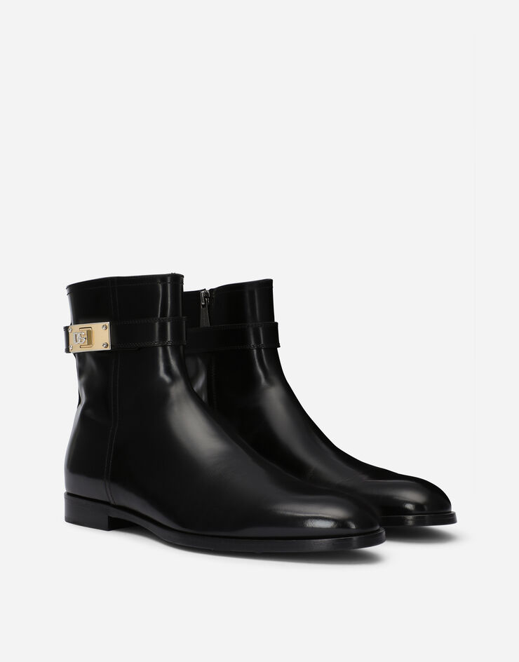 Dolce & Gabbana حذاء بوت برقبة للكاحل من جلد عجل مصقول أسود A60546AQ237