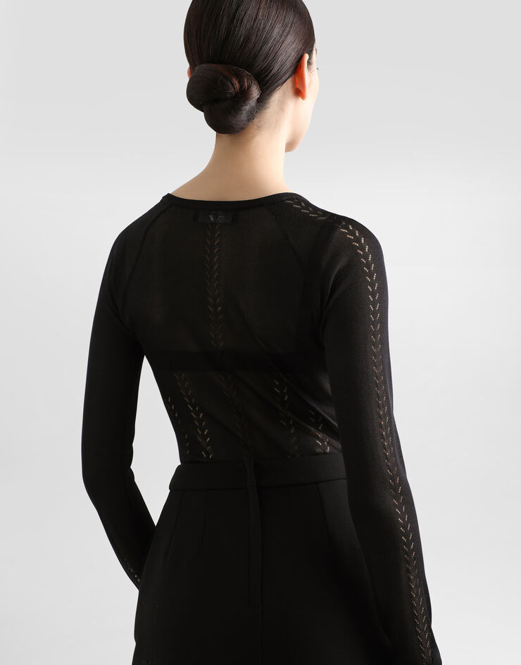 Dolce & Gabbana Pullover V-Ausschnitt aus Seide Schwarz FXY18TJBSLL