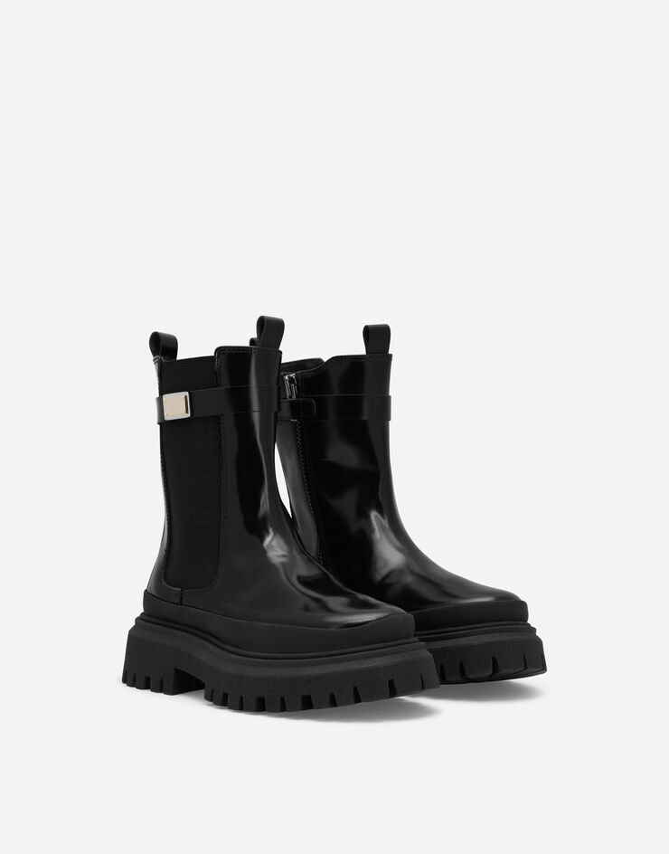 Dolce & Gabbana Bottes en cuir de veau avec plaquette à logo Noir D11137A1671