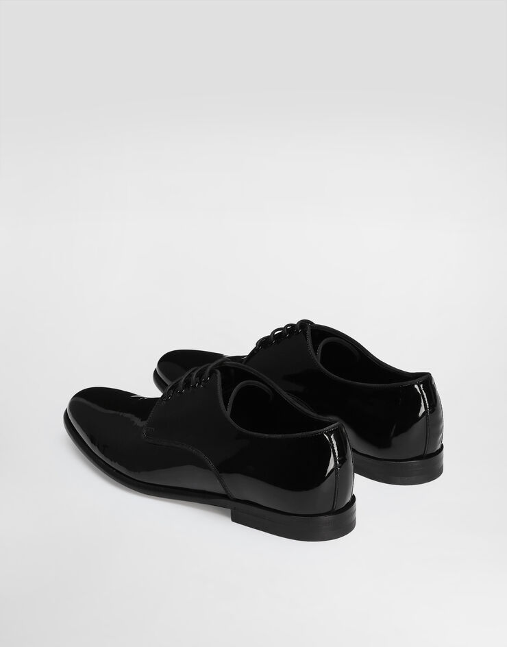 Dolce & Gabbana حذاء ديربي من جلد لامع أسود CN0105A1471