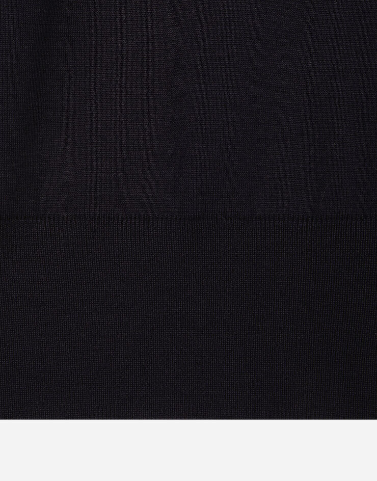 Dolce & Gabbana Jersey de cuello redondo de lana virgen con logotipo DG Azul GXX24ZJCVR3