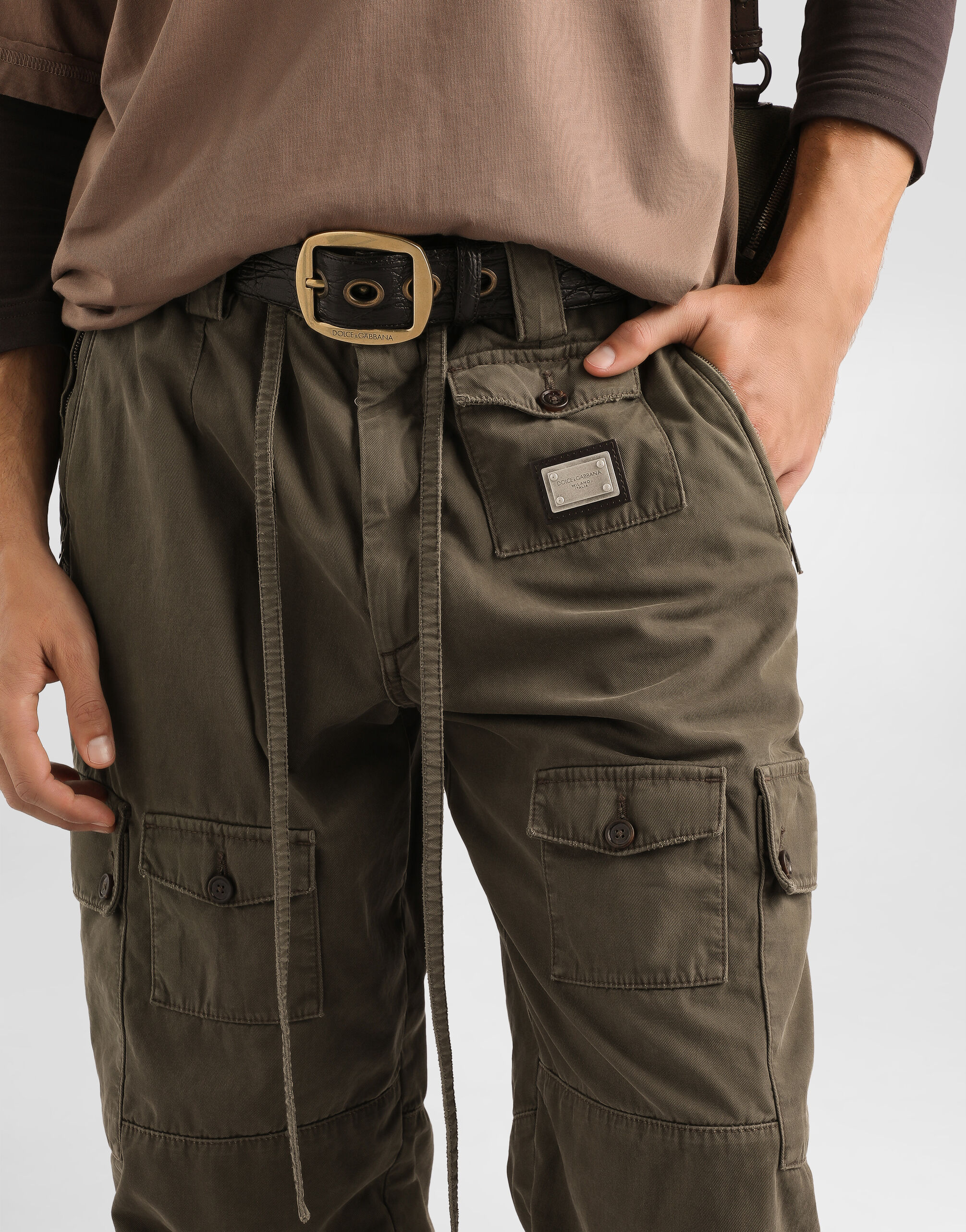 Resin-coated gabardine trousers