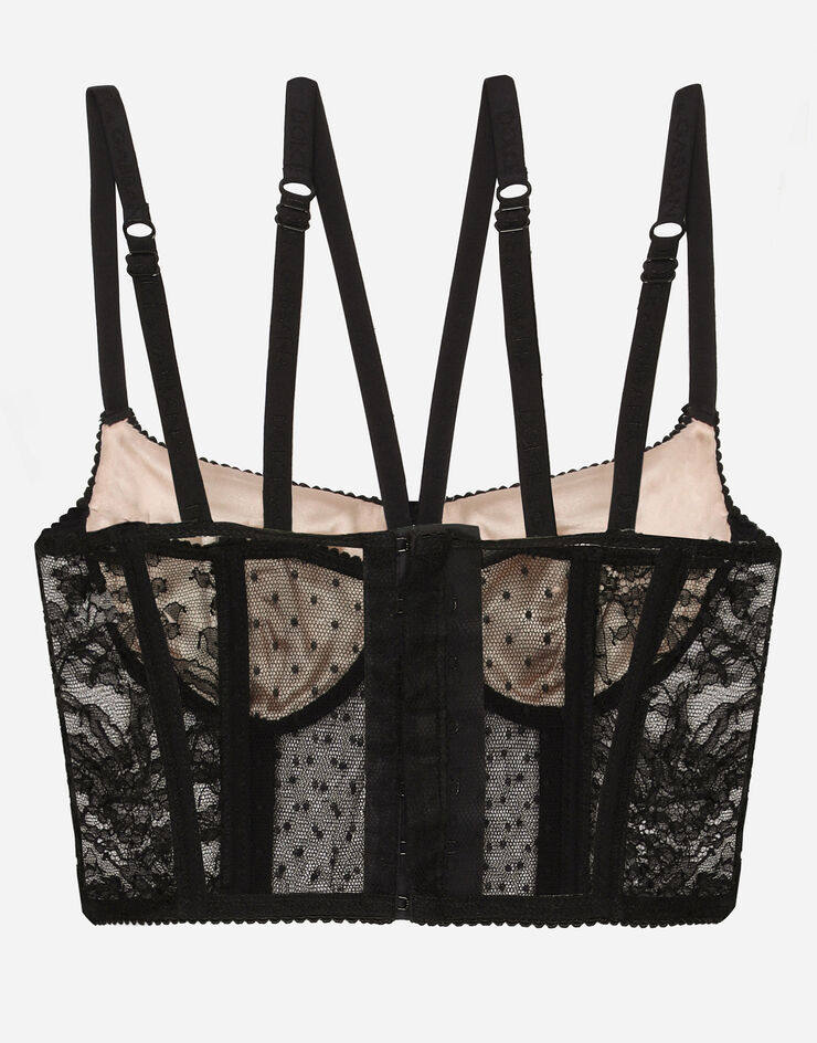 Dolce & Gabbana Das Dessous-Bustier mit schmalen Trägern ist aus floraler schwarzer Chantilly-Spitze gefertigt. Die leichte; glamouröse Optik wird all Ihren Looks eine verführerische Note verleihen. Schwarz O7C32TONO24